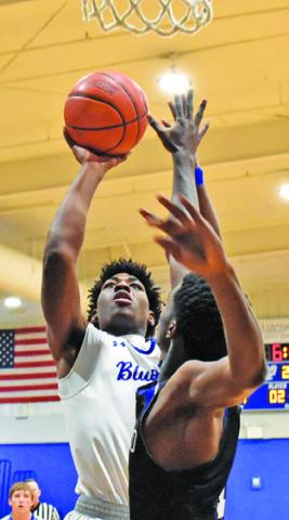 KE’TREEN CARTER of Snook takes a shot in last week’s loss to Mumford.