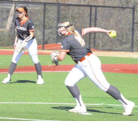 CALDWELL’S CALLIE FLETCHER pitches against Blooming Grove in the Lady Hornets’ first game at the Franklin Softball Tournament. Also pictured is Kyleigh Gomez. -- Tribune photo by Denise Squier