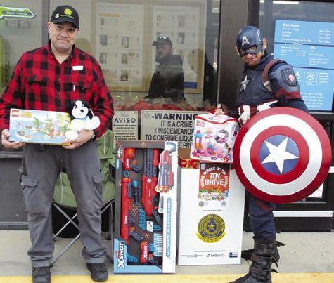 CAPTAIN AMERICA AND OTHERS from the Texas State Guard were collecting toys in front of Walmart on Sunday for the Young Heroes of the Guard’s annual toy drive. Monetary donations towards the drive are still being collected by sending a check to: Texas Toy Drive, Young Peoples Heroes of the Guard, P.O. Box 5218, Austin, Texas 78763-5218. Tribune photo by Denise Squier