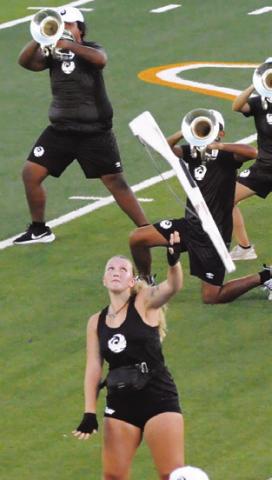 DRUM CORPS International’s Genesis performed at Hornet Field last Saturday night.