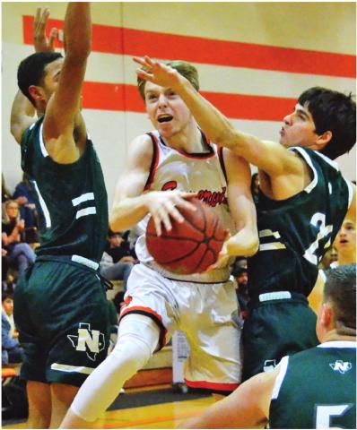GARRISON BALLARD GETS ready to take a shot last Friday against Normangee. Somerville kept it close through three quarters but the Panthers won 61-42. -- Tribune photo by Roy Sanders