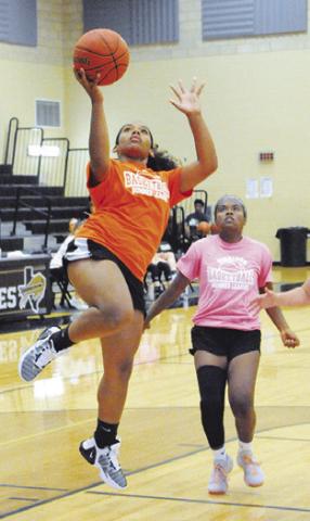 THE LADY HORNET Summer Basketball League Team won its first game over Giddings High School #1 last week. -- Tribune photo by Denise Squier