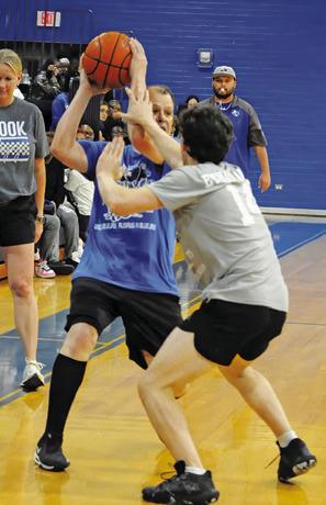 IN CASE YOU MISSED IT, there was a Snook alumni basketball game last Friday night, benefiting the Class of 2028, and some of the players were from the same families, but on opposing teams. Pictured are the Janacs: “Dad” Adam Janac and “Son” Ethan Janac.
