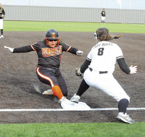 SOMERVILLE’S WENDY PEREZ slides into third base during the Lady Yeguas’ game against Giddings at the Thrall Softball Tournament last week.
