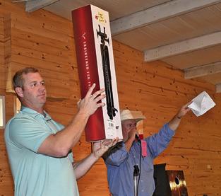 ITEMS ARE AUCTIONED on Saturday in Dime Box at the Lynnlee Kocurek fundraiser.