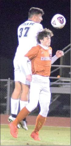 HORNET SOCCER player Lukas Weesner heads the ball during Caldwell’s season opener at Hornet Stadium. The Hornets lost to Manor New Tech 7-0. For more about the game, see inside. -- Tribune photo by Denise Hornaday
