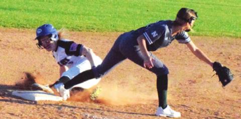 SNOOK’S LEIGHLA STRONG slides into third base during Snook’s game against Normangee last Friday afternoon. Normangee won the District 26-2A matchup won 28-4. -- Tribune photo by Denise Hornaday