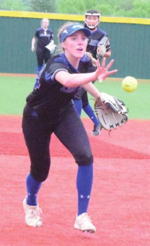 JAYCIE BRISCO tosses the ball to third baseman Leighla Strong during the Snook-Centerville bi-district game last Friday.