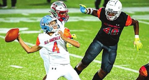 KASE EVANS OF LEXINGTON quarterbacked during the 2022 Under Armour Futures All-American Game in Orlando, Florida, on Jan. 2. He is an eighth-grader. -- Photo courtesy of Under Armour