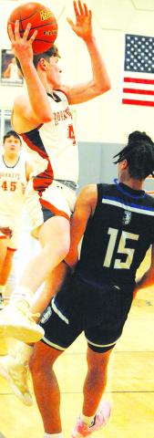 CALDWELL’S NATHAN Scott hurls this pass against Manor New Tech on Saturday.