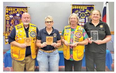 CALDWELL BURLESON COUNTY Lions were recognized and received plaques for outstanding service to the Club: Ken Wiltz, Club President for two years, and Kathy Cornett, Club Events Chair for four years. Also, Jack Wiech awards were presented to Margaret and Bemie Polansky at the Texas Lions Camp. Photo courtesy of Adrien Drouilhet