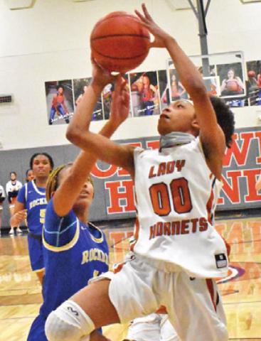 CALDWELL’S JA’ASIA Mathis shoots during Caldwell’s home win over Rockdale last Friday night. Mathis scored 30 points in the victory.