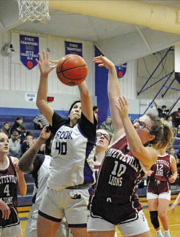 SNOOK’S KARLA LARA pulls down a rebound during the Lady Jays’42-31 win over Fayetteville last Tuesday night in Snook.