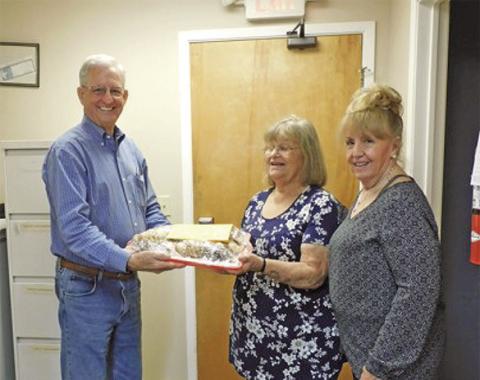 SOMERVILLE CITY HALL recently received cookies from the Order of the Eastern Star as appreciation for all that the city does. The cookies were shared with all employees of the city and were very appreciated. Pictured are Marty Mangum, Interim City Administrator, Deb Healy, Code Enforcement and Gayla Townsend, of the Order of the Eastern Star. Photo courtesy of Kathy Pollock, City of Somerville