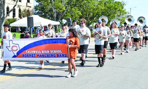 THE CALDWELL HIGH SCHOOL Hornet Band marched and performed music during last Saturday’s Burleson County Fair Parade. Tribune photo by Roy Sanders