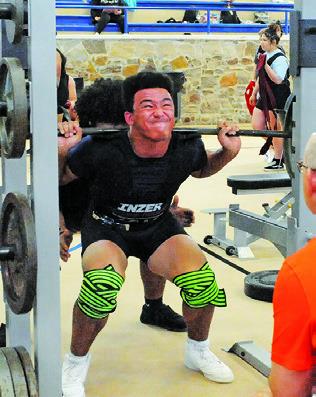 SOMERVILLE’S CHRIS DEERE lifts during Saturday’s Somerville Invitational Powerlifting Meet held in the Yegua Center. Tribune photo by Denise Squier