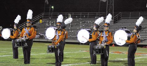 CALDWELL HIGH SCHOOL’S marching band performs at halftime of the Caldwell-Gonzales football game in Gonzales.