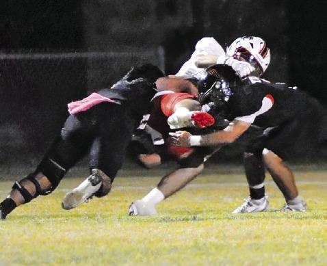 SOMERVILLE’S MARTIN ESPINOZA and Jayden Young make a tackle make a tackle against Burton in the homecoming game. Tribune photo by Denise Squier