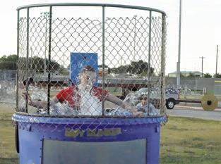 KAELY BROWN was put into the dunk tank at the “Caldwell Homecoming Kickoff” event. Tribune photo by Denise Squier