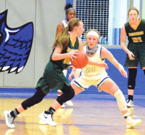 SNOOK’S JAYCIE BRISCO KEEPS pace with Academy point guard Aislinn Chaffin during the Lady Jays’ 43-24 win over Little River-Academy last Tuesday afternoon. -- Tribune photo by Denise Hornaday