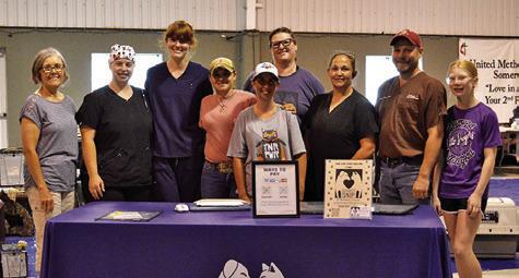 PROJECT SNIP VOLUNTEERS and veterinary staff worked together to spay/neuter 54 cats at the Monday, Aug. 4 TNR clinic. Tribune photo by Sabine Lazo
