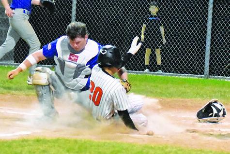 AXEL NOYOLA OF Somerville slides into home against Frassati Catholic in their Friday game at the Somerville Classic Tourney. Tribune photo by Roy Sanders