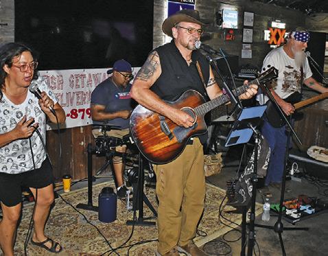 THE RED DIRT Ramblers Band performs on Saturday, June 21, at a benefit for Jody Hammons at Sidetrack’d Icehouse in Somerville. Pictured are, from left, Stacie Crocker, Juan Fraustro on drums, and Sy Nichols and Billy Gage on guitars.