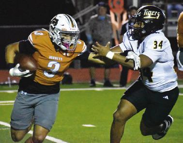 COY BECKA OF Caldwell breaks away from this Sealy defender. Tribune photo by Roy Sanders