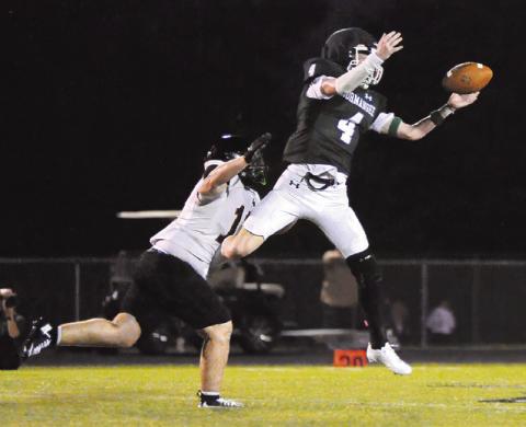 SOMERVILLE’S LUKE MOSES moves in for a tackle as this Normangee receiver lunges for the football. Tribune photo by Denise Squier
