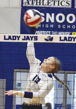 DAKOTA KIENOW gets a kill during the Snook-North Zulch match on Friday. Tribune photo by Roy Sanders