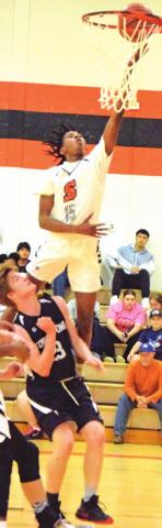 SOMERVILLE’S BRANDYN Carter scores against Cornerstone Academy at the tournament. -- Tribune photo by Denise Squier