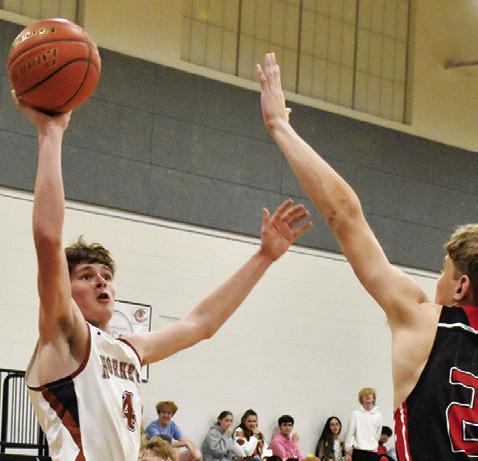NATHAN SCOTT GETS this shot off despite some pressure from the defense against Salado. -- Tribune photo by Roy Sanders