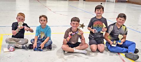 MEMBERS OF THE CUB SCOUT PACK 181 are pictured with their cars and trophies at the annual Pinewood Derby. Pictured, from left to right: Lucas Sandage, Charlie Curry, Nicholas Sandage, Asher Strouth, JakeRyan Baron. Photo courtesy of Pam Cantey