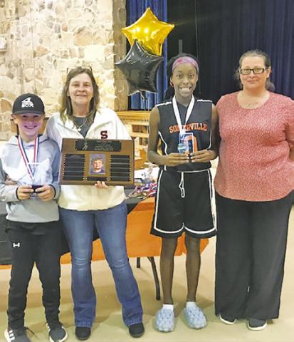 SOMERVILLE YOUTH SPORTS held its annual Fall Sports Awards Ceremony on Monday, Nov. 14, and named Hunter Knesek and Janaya Isom as the recipients of the Payton Francis Award. Also pictured are Stacy Crigler and Amber Taylor.