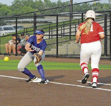 SNOOK’S ALEXIS MACIK PREPARES to catch the ball at first base during Thursday’s area game against Bremond. -- Tribune photo by Denise Squier