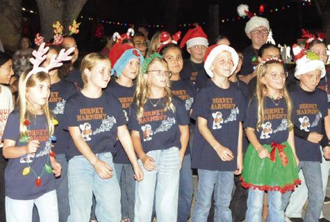 THE CALDWELL INTERMEDIATE School Choir sang for the crowd at last Friday’s “Christmas on the Square.” Tribune photo by Denise Squier