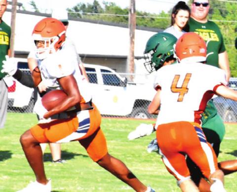CALDWELL’S JAMAR HEWITT breaks free against Lexington.