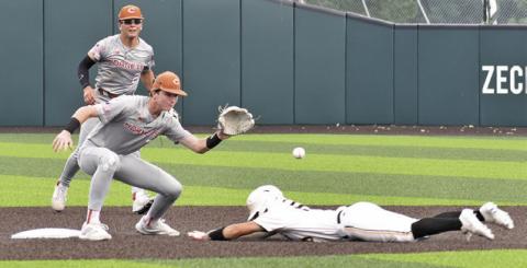 SHORTSTOP RYAN SEE gets ready to catch this ball and tag the Gatesville base runner out in the Thursday game in Waco. -- Tribune photo by Roy Sanders