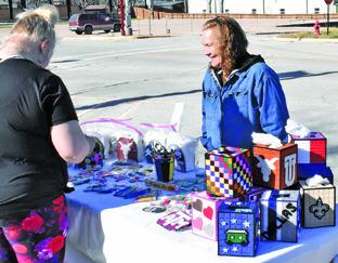 AGNES HACKNEY DISPLAYS her products on Saturday, Jan. 3, at the Farmers Market in downtown Caldwell.