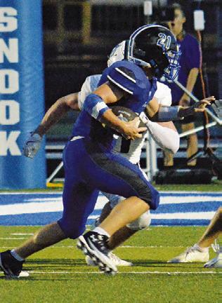 SNOOK’S OFFENSE gets going against NBCA last Friday. Tribune photo by Kim Hutcheson