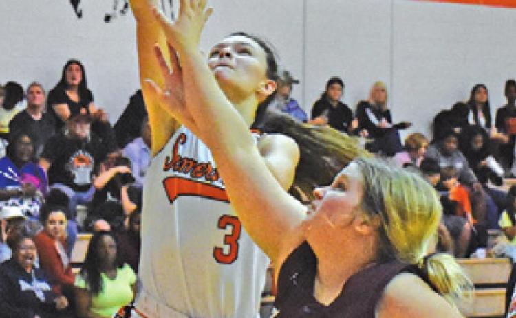 EMMA KOVASOVIC DRIVES for a layup during the Somerville-Fayetteville game last week. -- Tribune photo by Roy Sanders