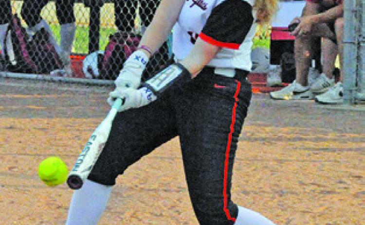KYLIE NEUENDORFF makes contact with the ball during Somerville’s home game against Burton on Friday. Tribune photo by Denise Squier