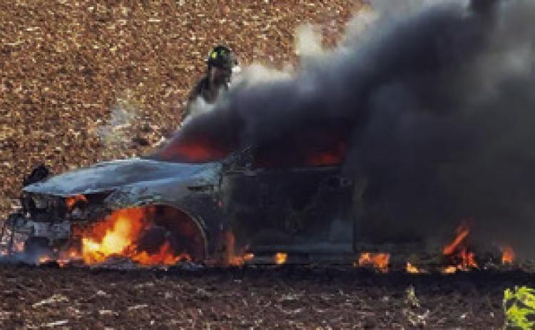 A WOMAN ESCAPED from this car on Wednesday afternoon, Sept. 30, on F.M. 60 near Snook after her brakes malfunctioned. Photo courtesy of Ben Peck