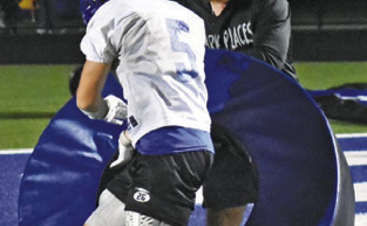 NOLAN LANHAM works with the football team during a fall 2025 practice session.