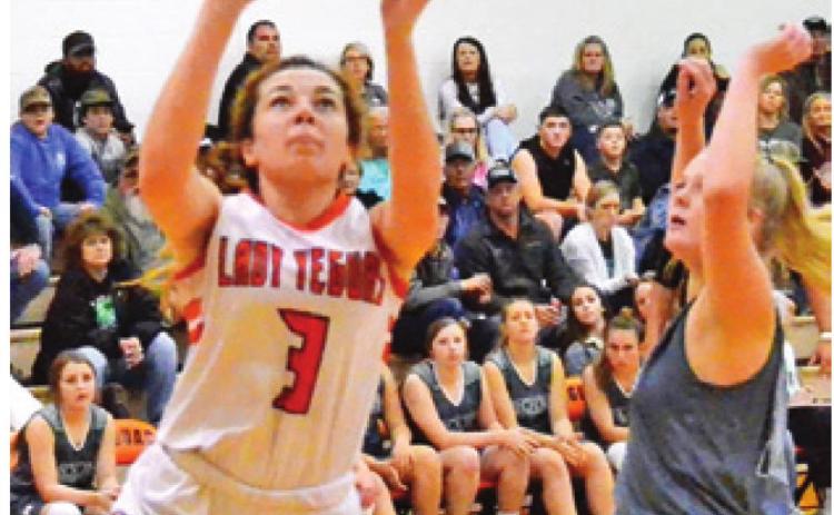 MADDIE COOPER shoots a layup during Somerville’s 76-29 home win over Normangee Friday night. -- Tribune photo by Roy Sanders