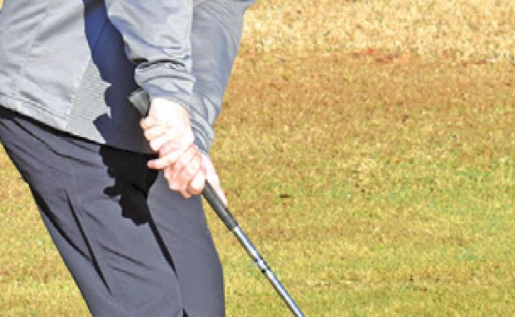 CADEN SCHLUENS of Snook warms up before the Caldwell Tournament on Monday.
