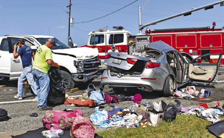 THE VEHICLES FROM THE accident scene are in the southbound lane of SH 36 South. Tribune photo by Roy Sanders