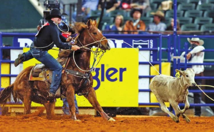 CALDWELL’S WESTYN HUGHES recently competed in Tie-Down Roping at the National Finals Rodeo in Arlington. -- Photo courtesy of Roseanna Sales, PRCA ProRodeo Photography
