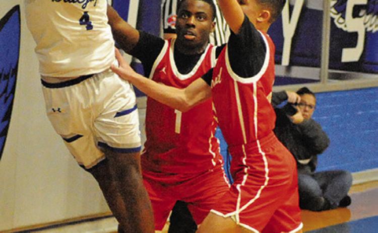 JOHN CARR OF Snook prepares to pass against Bremond. Tribune photo by Roy Sanders