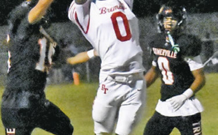 ULISSES PEREZ and Jaille Deere defend and break up this Bremond pass. Tribune photo by Roy Sanders